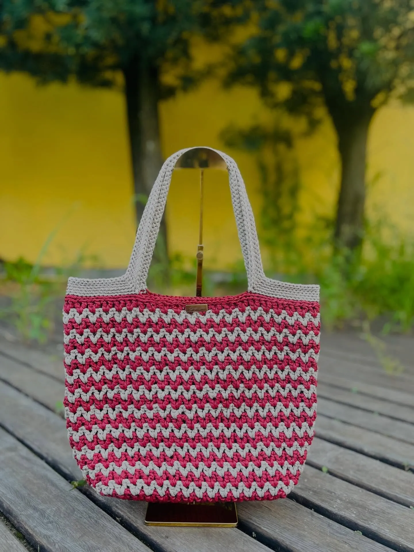 Fiorella Bag in red and cream zigzag-striped crochet, with cream handles
